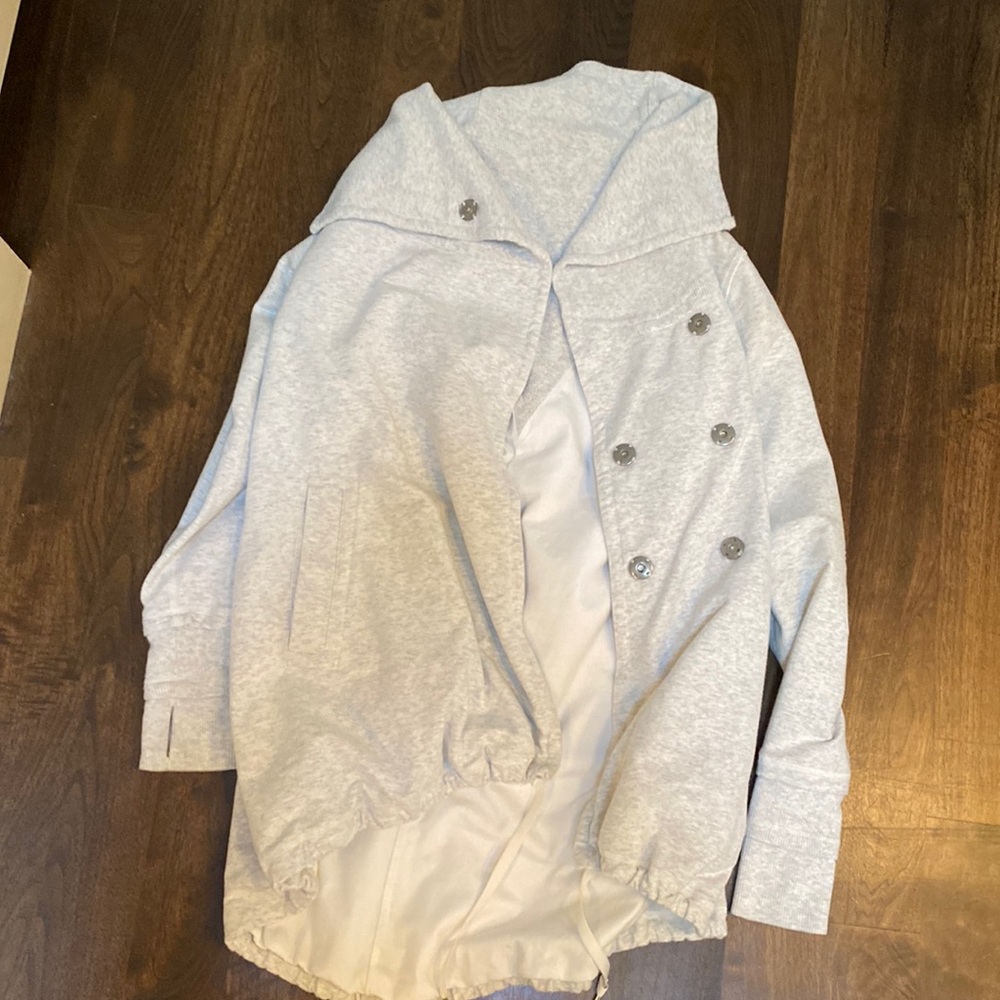 Size 4 Lululemon sweatshirt with snaps, thumb hole sleeves and drawstring bottom